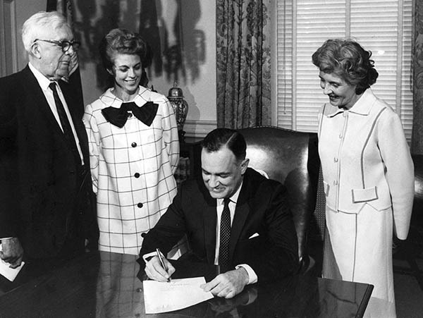 Gov. Mills Godwin signs the bill that consolidated Richmond Professional Institute and the Medical College of Virginia into one entity, creating Virginia  Commonwealth University in 1968.