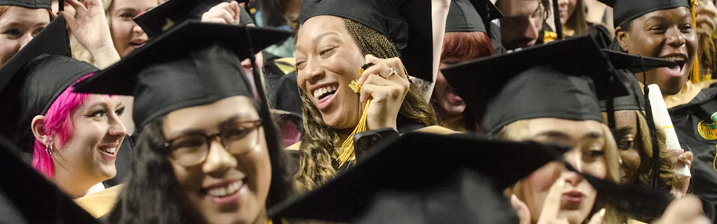M.S.W. graduates celebrate during the school's commencement ceremony.